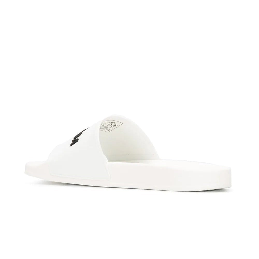 Balenciaga - Logo Embossed Pool Slides - kickpit